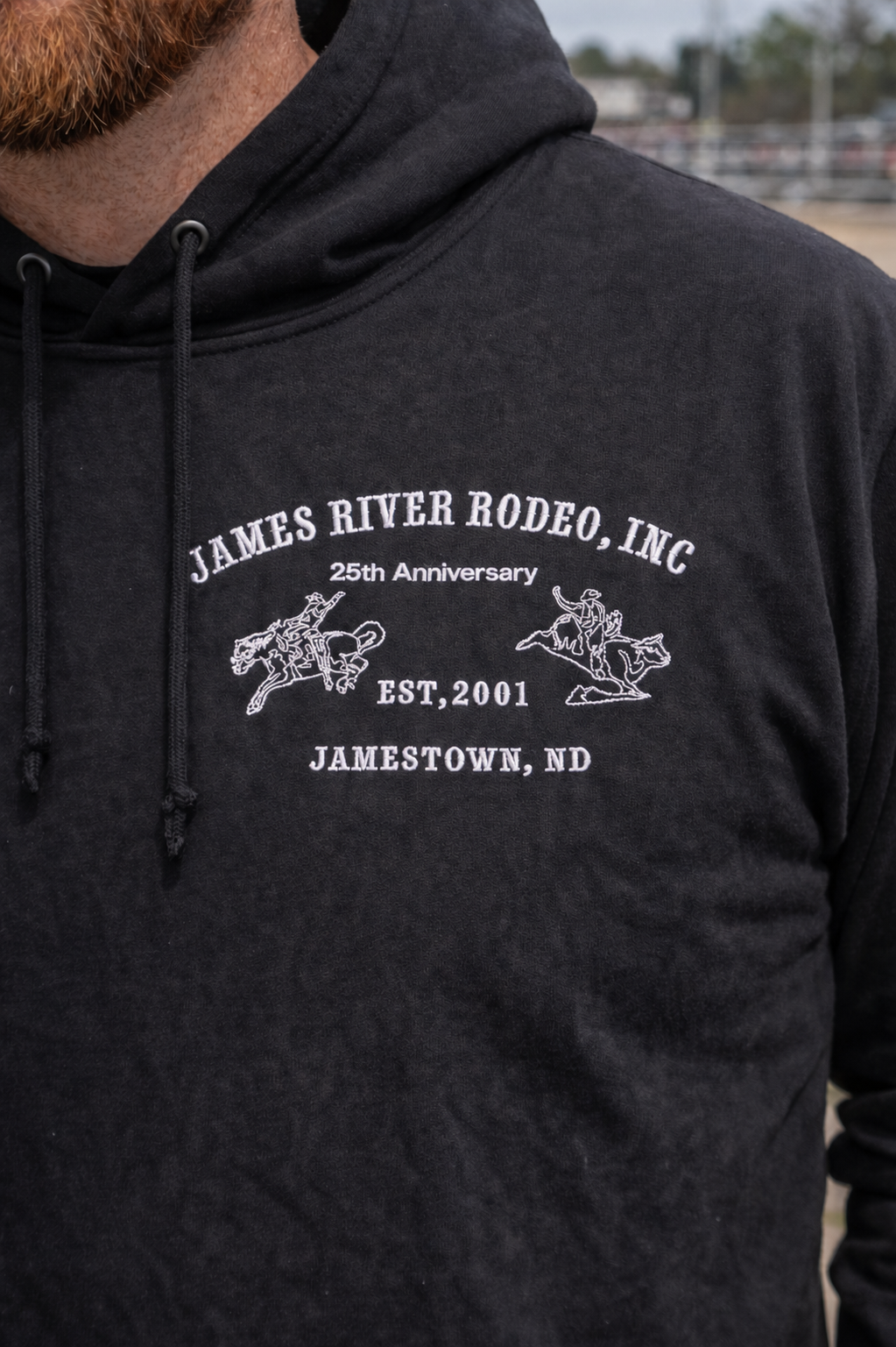 Black James River Rodeo hoodie with white embroidery on the front left chest