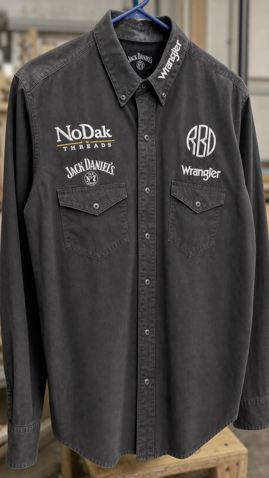 Black western shirt embroidered with the RBD brand, NoDak Threads logo, and existing Wrangler details