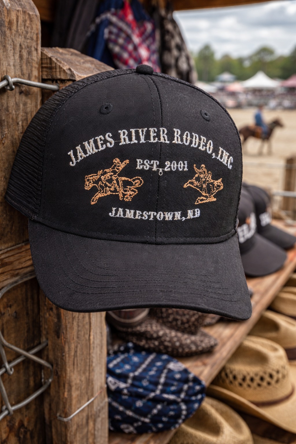 Black James River Rodeo hat with embroidered rodeo artwork